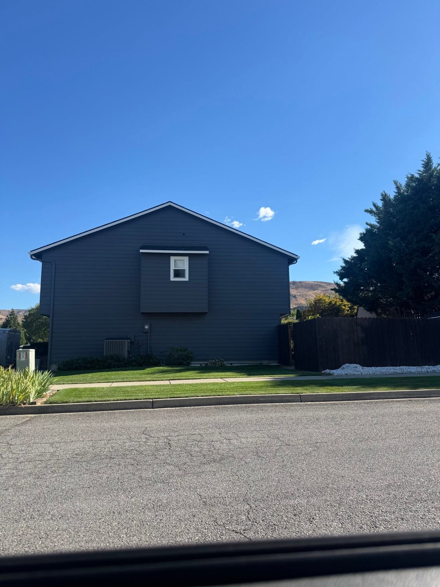Repainted home exterior in Wenatchee WA by Greenpoint Construction