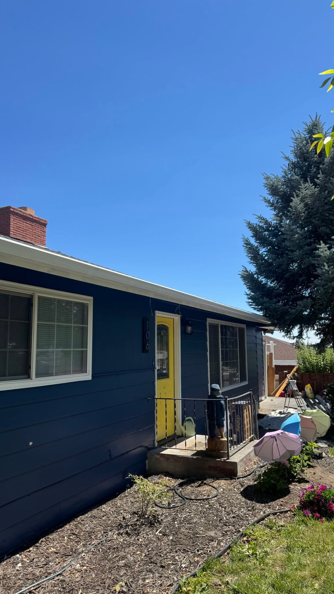 Navy blue exterior house painting in Wenatchee WA